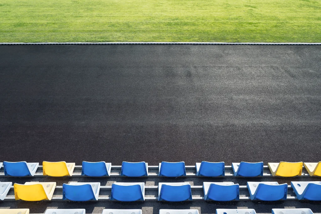 World Athletics Sertifikasyonu top view of tribune empty plastic seats in blue an 2025 01 15 14 00 57 utc 1